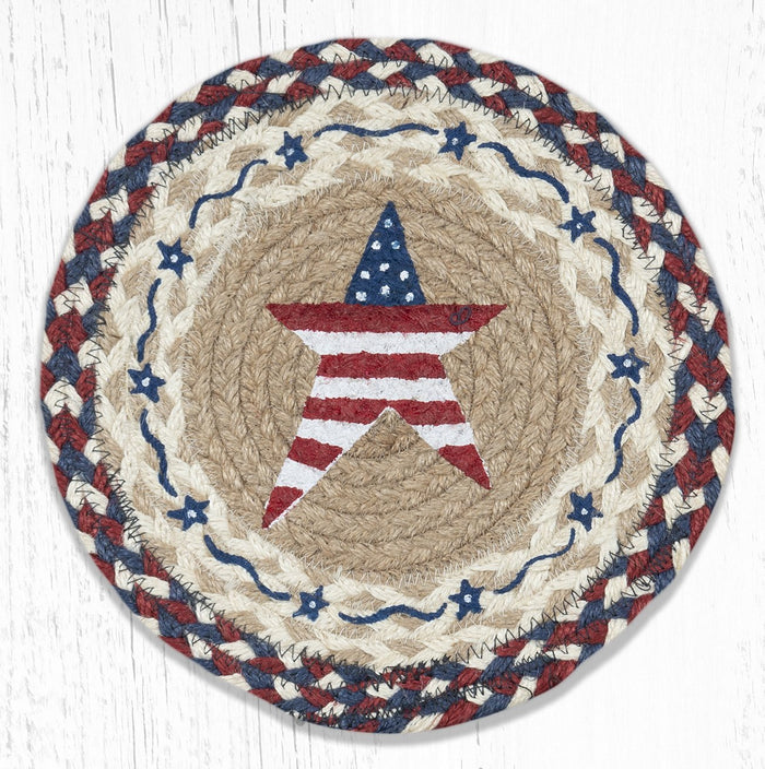 A round, hand stenciled trivet with a primitive American star design, featuring red, white, and blue colors on a natural jute background.