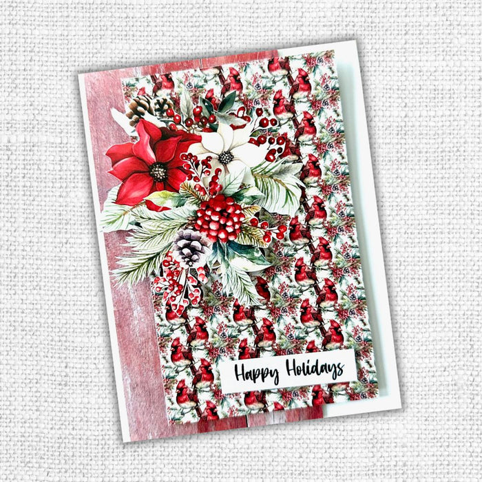 Paper Rose Studio - Cut Aparts Paper Pack - Jolly Holidays. Expertly curated for the festive holiday season, the Jolly Holidays Collection showcases a classic red and green color palette with touches of black and features traditional Christmas images. Available at Embellish Away located in Bowmanville Ontario Canada. Example by brand ambassador.
