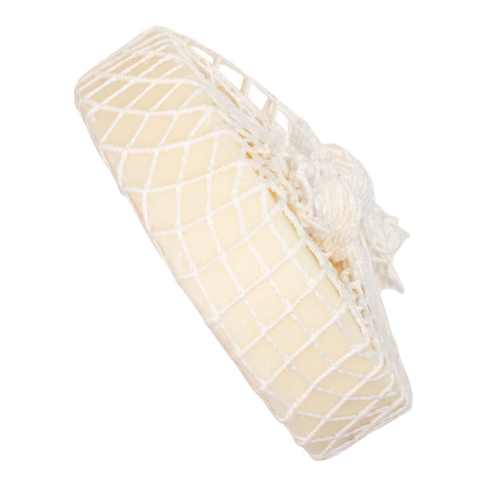 Side view of lemon eucalyptus scented stain remover soap bar packaged in a net.