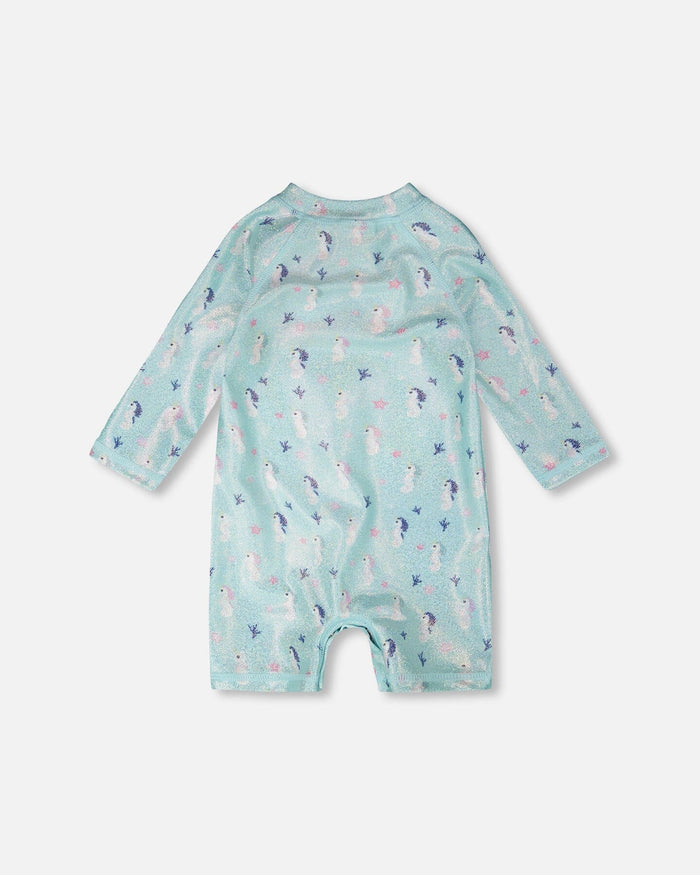 Back flat lay showing zipper and allover blue seahorse print on baby and toddler rashguard swimsuit