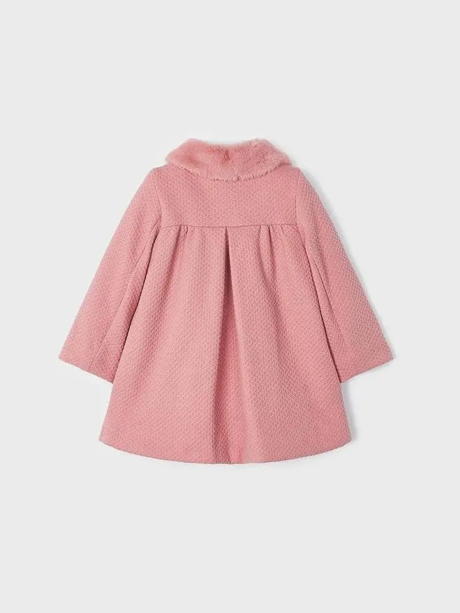 Back view of Mayoral baby girl pink structured coat with flared shape and long sleeves.