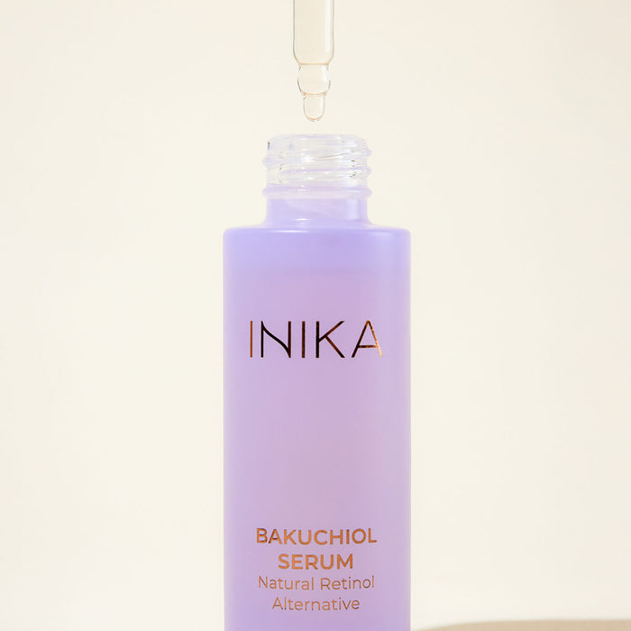 Open dropper bottle of certified organic Bakuchiol Serum.