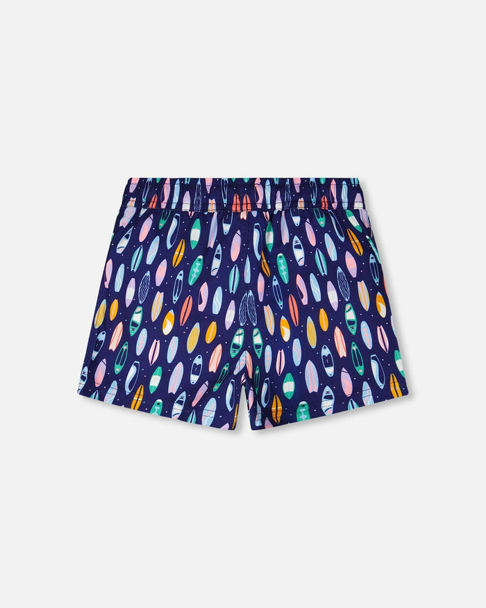 Back view of blue surfboard print boardshorts for boys