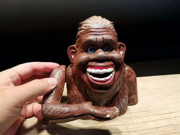 Cast Iron Smiling Bigfoot Sasquatch Coin Bank