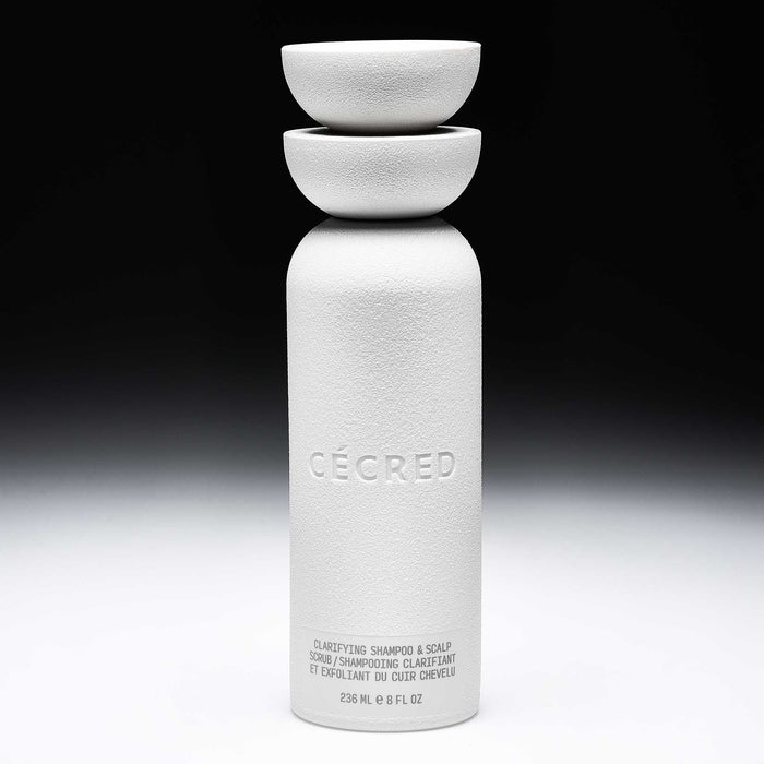 Cécred Clarifying Shampoo & Scalp Scrub 236ml bottle with dual bowl cap displayed upright against a gradient black-to-white background
