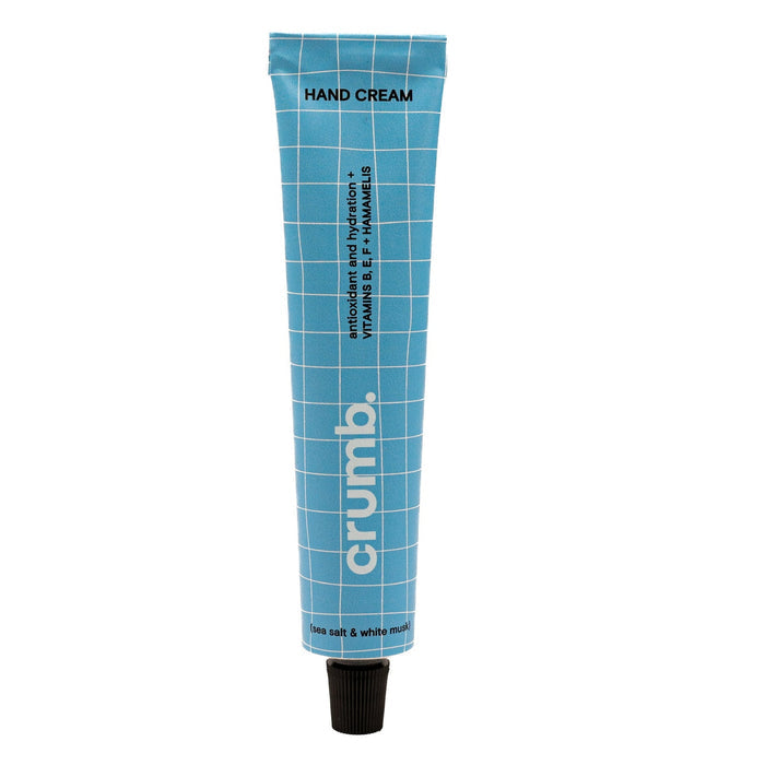 crumb blue tube of hand cream sea salt & white musk on a white background