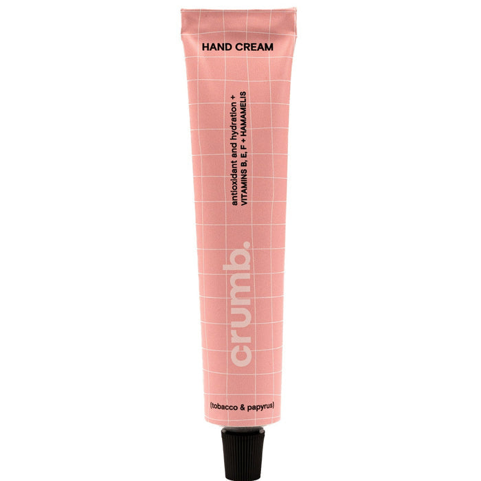 crumb pink hand cream tube tobacco & papyrus on a white background