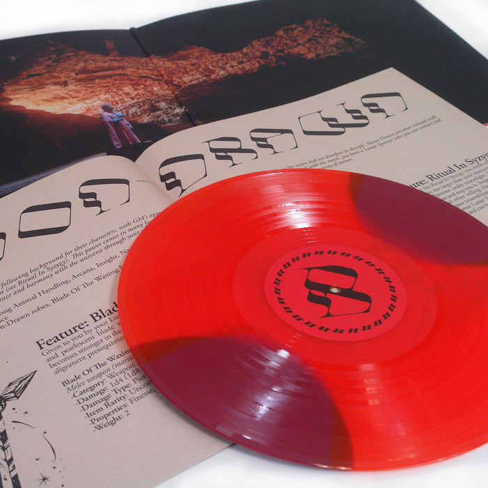 Foxing "Draw Down The Moon" Vinyl Album cover. DDTM letters above a man walking with a sword on a plain with mountains in the background. Vinyl variant color is called "Phase"