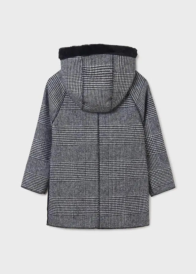 Back view of Mayoral girls black plaid coat showing hood, long sleeves, and lined outerwear design.