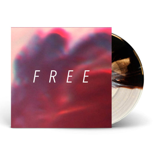 A Hundredth vinyl record partly out of its sleeve, set against a blurred pink and purple background with FREE in bold white letters—special Half Clear + Half Chocolate w/ Cream Splatter LP edition.
