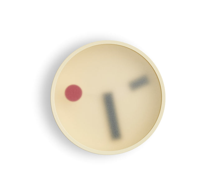 Front view of Yellow Kehai Clock by Koizumi Studio against white background.