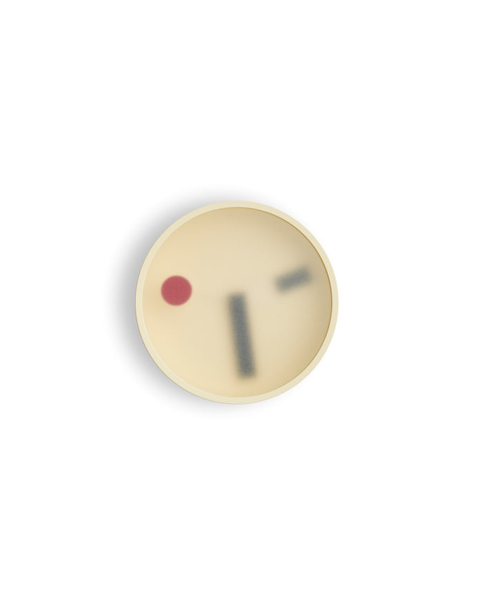 Zoomed out front view of Yellow Kehai Clock by Koizumi Studio against white background.
