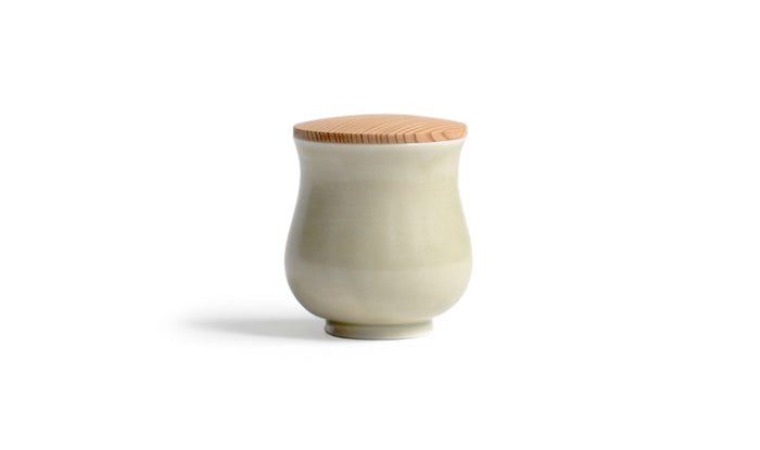 Cedar Lidded Gourd Teacup by Simplicity silhouetted against white background