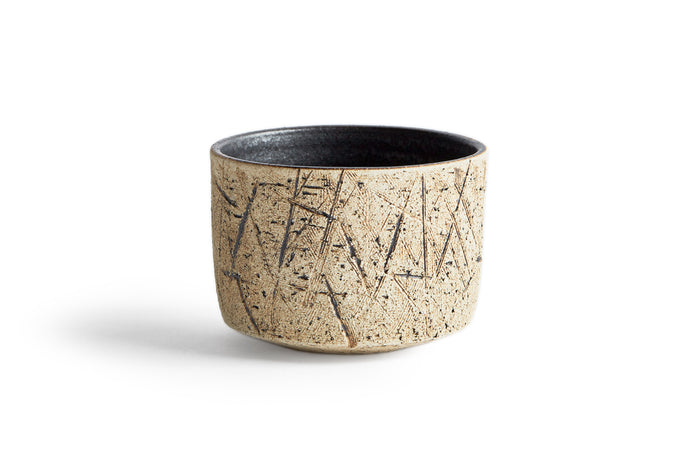 Silhouetted image of the kuro black matcha bowl against white background.