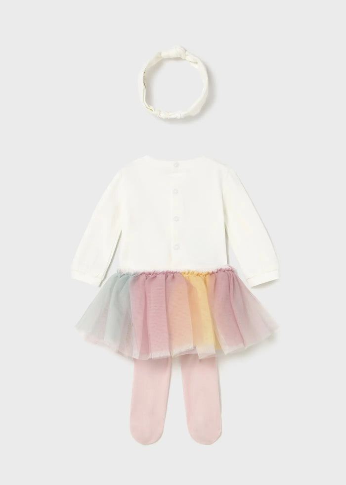 Playtime action shot highlighting stretch, breathable cotton, and secure snap closures.