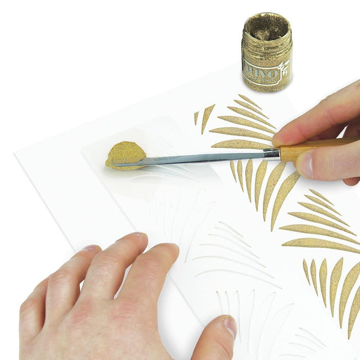 Nuvo - Glimmer Paste - 1.7 oz. Nuvo Glimmer Paste can provide unique variety to your work. Use in combination with any stencil to create dimensional strip designs or bring texture and sparkle to larger areas and projects. The high concentration of glitter is sure to add a vibrant shimmer to whatever you are creating.  Available at Embellish Away located in Bowmanville Ontario Canada. Glitterati Gold example.