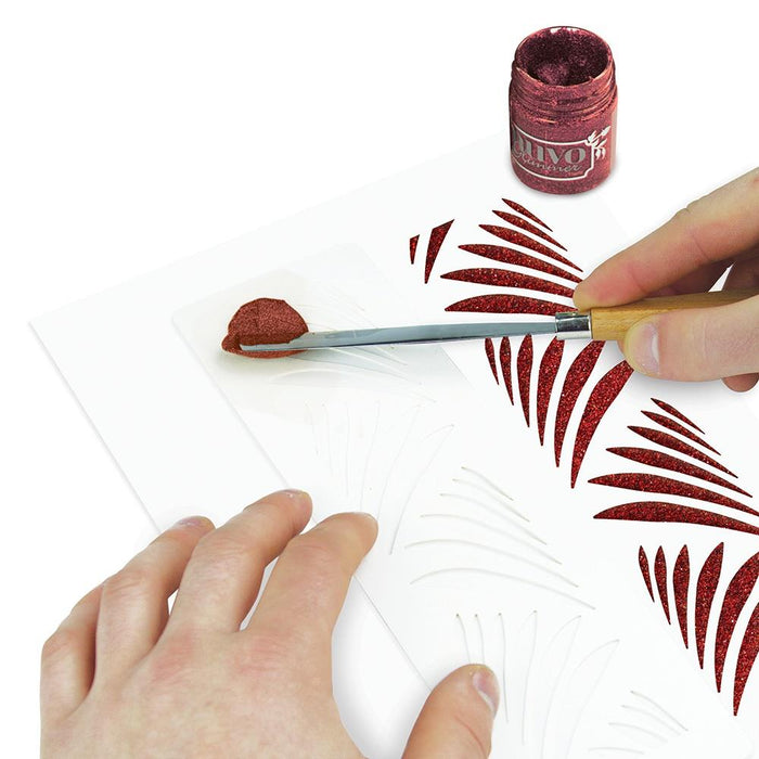 Nuvo - Glimmer Paste - 1.7 oz. Nuvo Glimmer Paste can provide unique variety to your work. Use in combination with any stencil to create dimensional strip designs or bring texture and sparkle to larger areas and projects. The high concentration of glitter is sure to add a vibrant shimmer to whatever you are creating.  Available at Embellish Away located in Bowmanville Ontario Canada. Sceptre Red example.