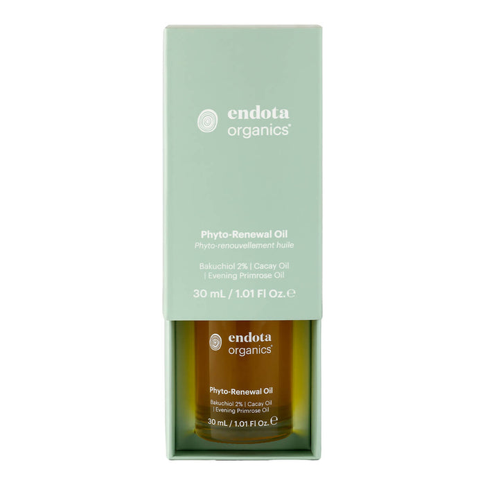 A partially open box of endota Phyto Renewal Oil, with the 30ml glass dropper bottle visible inside. The box is designed with branding and product details, and the bottle is neatly positioned within it.