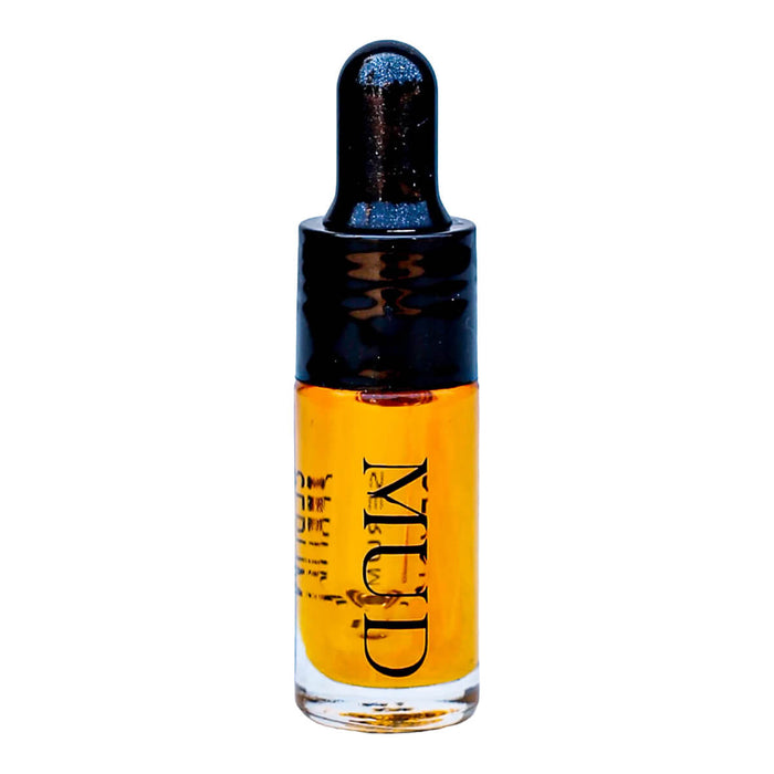 5ml glass dropper bottle of Mud Organics Sea Buckthorn Serum, a hydrating and nourishing formula that improves the aging process, repairs sun damaged skin, and helps diminish hyperpigmentation.