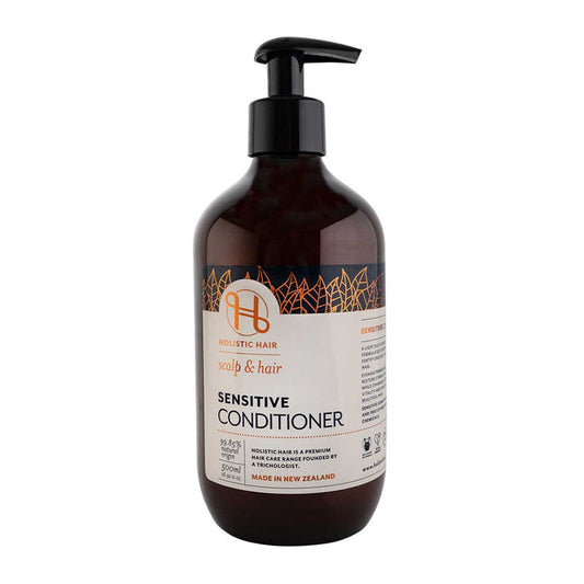 A bottle of Sensitive Conditioner with a pump dispenser, predominantly dark brown in colour with a white label featuring text and branding.