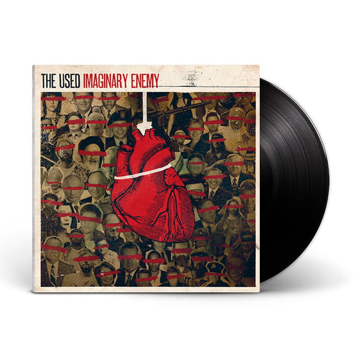 A black vinyl record by The Used with cover art showing a red anatomical heart above a crowd whose eyes are hidden by red bars. The words “THE USED IMAGINARY ENEMY” evoke a sense of revolution.