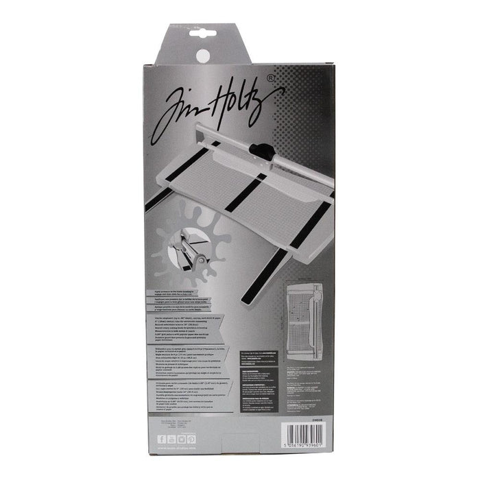 Tim Holtz - Rotary Media Trimmer. Featuring a geared rotary cutting blade, this trimmer effortlessly cuts through a range of crafting mediums. Available at Embellish Away located in Bowmanville Ontario Canada.