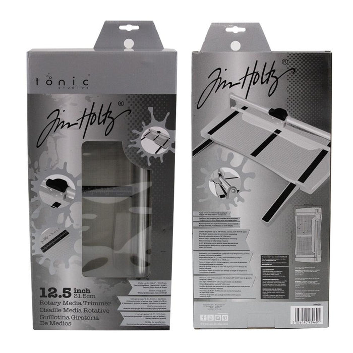 Tim Holtz - Rotary Media Trimmer. Featuring a geared rotary cutting blade, this trimmer effortlessly cuts through a range of crafting mediums. Available at Embellish Away located in Bowmanville Ontario Canada.