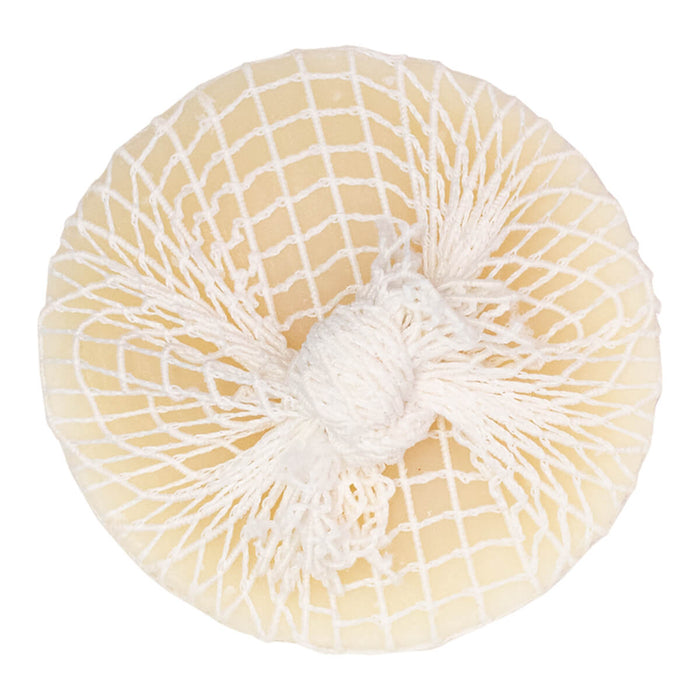 Front view of lemon eucalyptus scented stain remover soap bar packaged in a net.