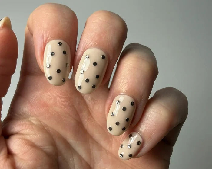 Cream Drop UV-Free gel nail wraps worn on the hand