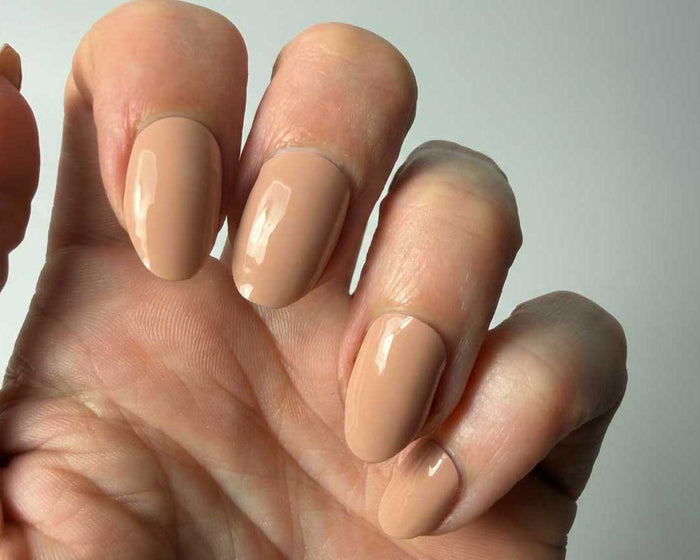 Peaches N Cream UV-Free gel nail wraps worn on the hand