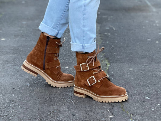 Fashionable work boot style European ankle boot. Comfortable women's boots hand made in Spain from quality suede leather, zipper and lace-up with buckle detail. Chunky rubber sole with a tan upper.