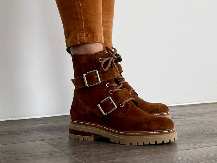 Fashionable work boot style European ankle boot. Comfortable women's boots hand made in Spain from quality suede leather, zipper and lace-up with buckle detail. Chunky rubber sole with a tan upper.