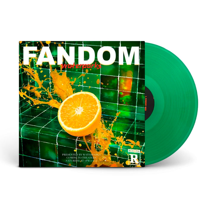 A Waterparks Green LP partially slides out of its cover, displaying an orange splashing against a green tiled wall with FANDOM in bold white letters above and a cinematic R rating label in the corner.