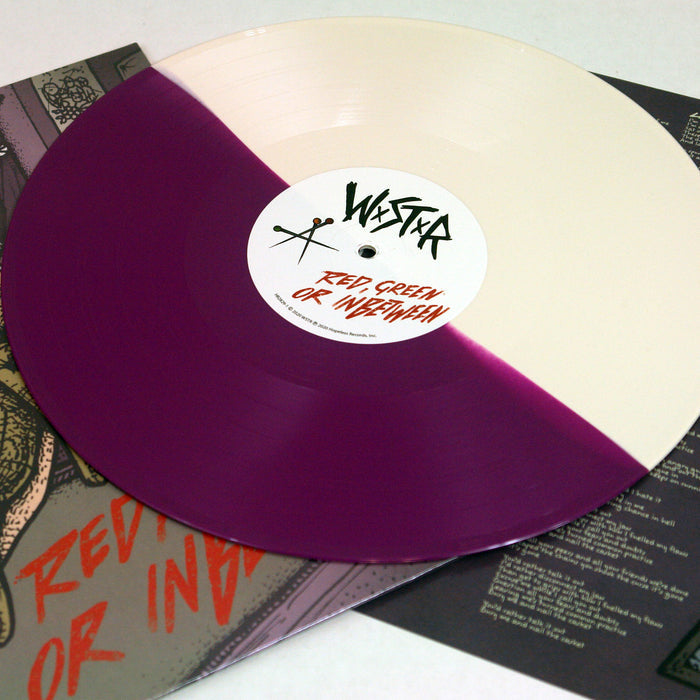 A WSTR Purple & Bone Split Vinyl, featuring cream and deep purple halves, rests on its album cover. The label displays WASTE and RED, GREEN, OR INDESCRIBABLE in bold black and red—ideal for any WSTR collection.